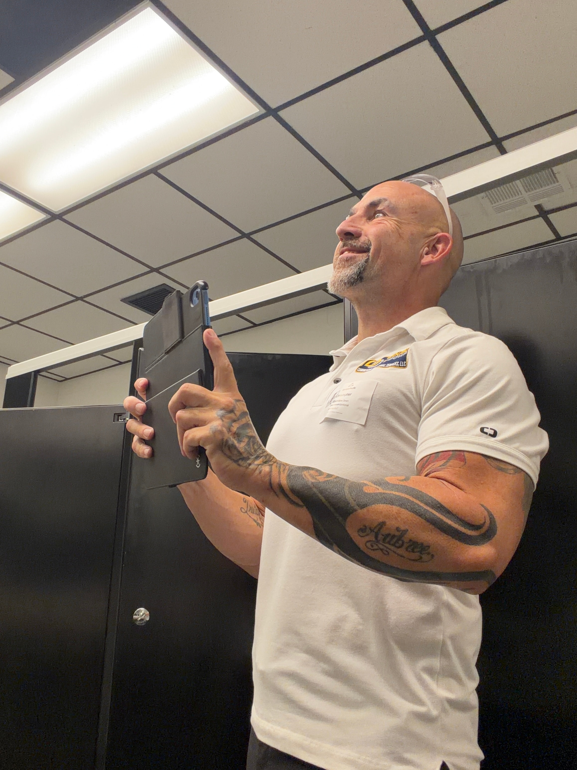 Commercial cleaning professional during a facility walkthrough